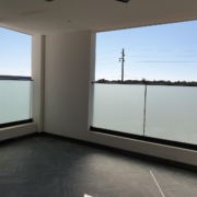 Brightness Glass And Glazing Services Pty Ltd - channel fixed glass fence Installation - Sydney Metro