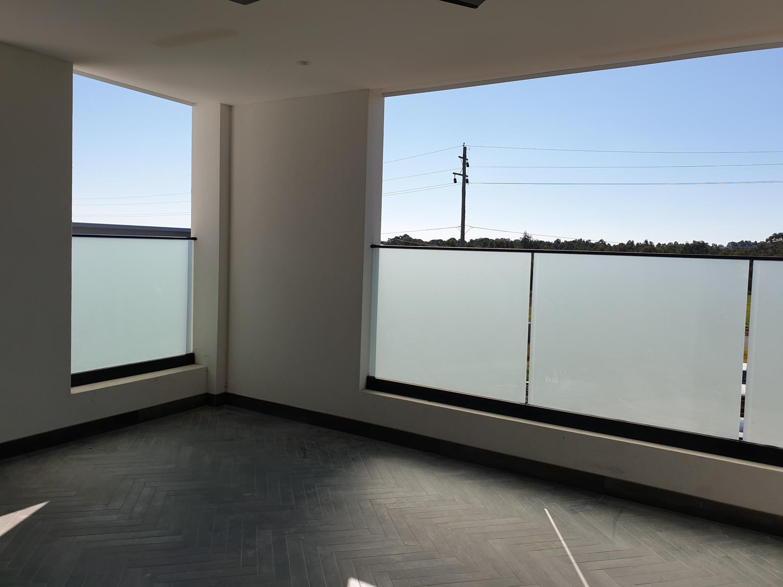 Brightness Glass And Glazing Services Pty Ltd - channel fixed glass fence Installation - Sydney Metro